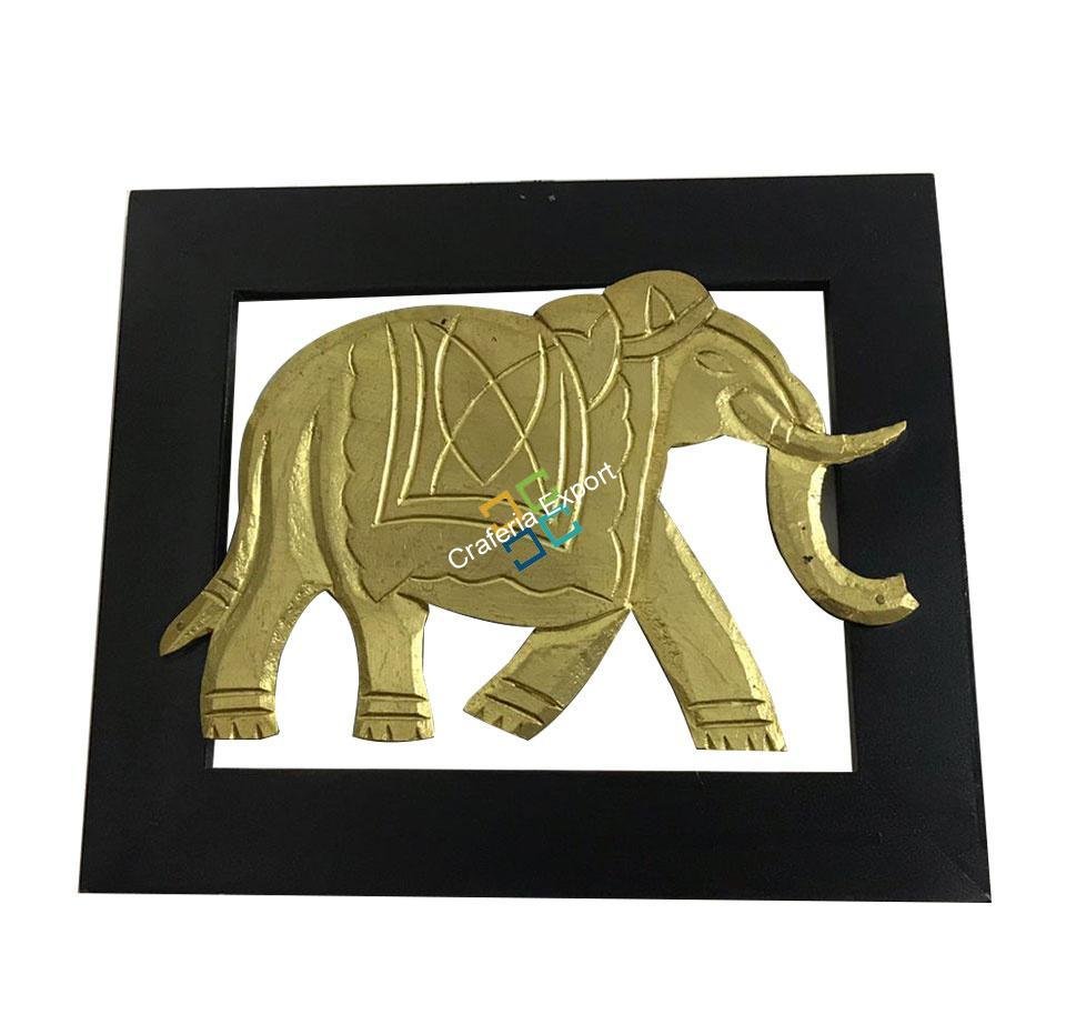wooden frame of brass elephant for wall decor