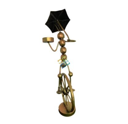 metal tribal lady with umbrella tea light candle holder